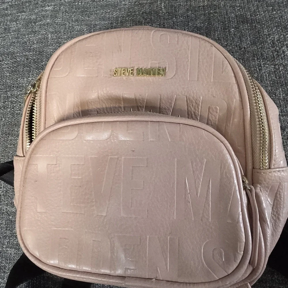 Steve Madden Mini Logo Embossed Backpack Light Pink Faux Leather Black Straps